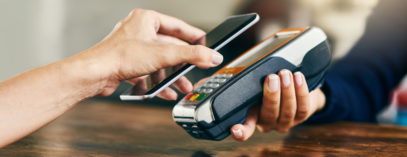Using cell phone to pay a merchant
